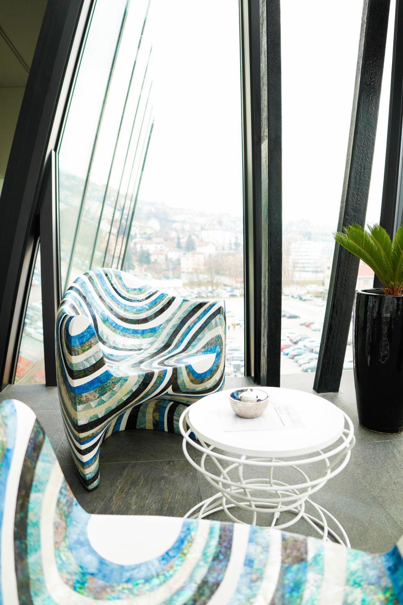 Swissotel Sarajevo Exterior photo Chair by Karman